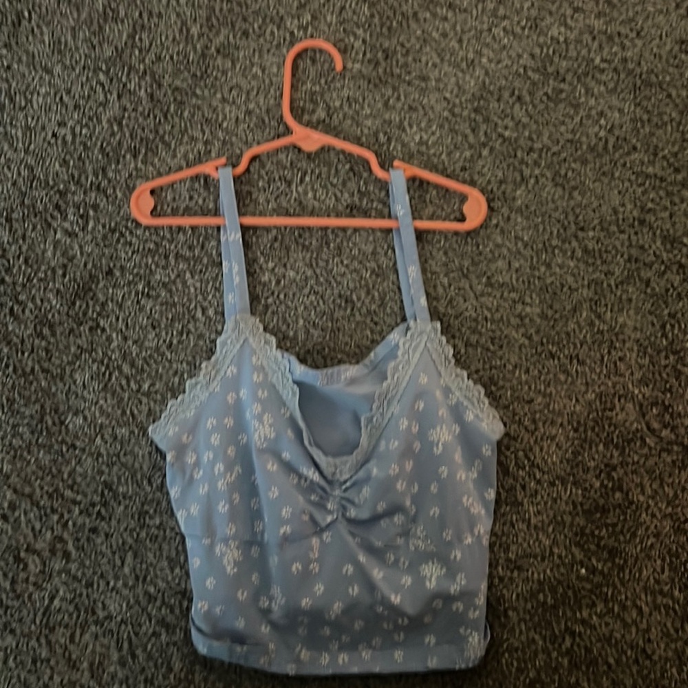 Light blue flowered crop too